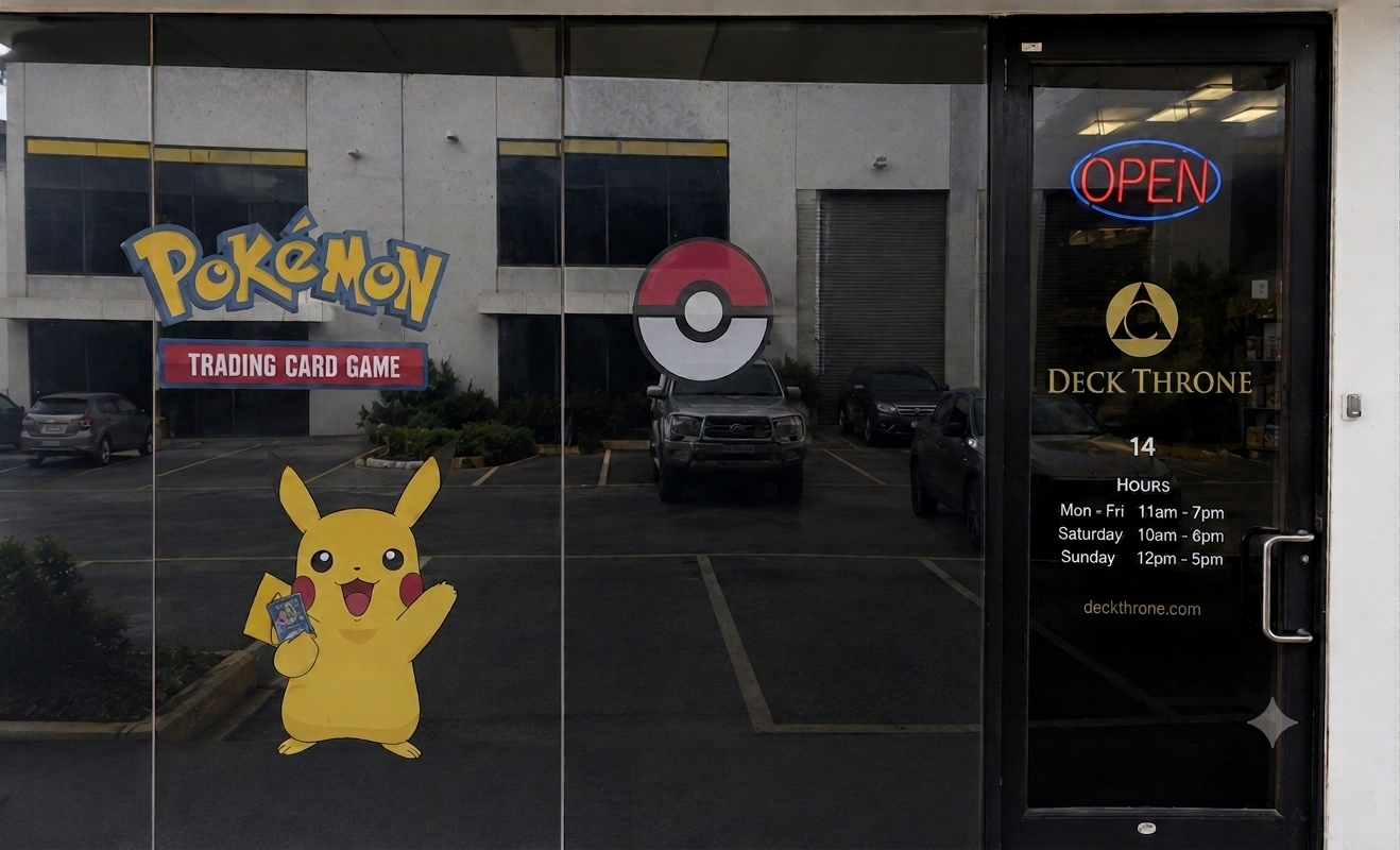 Deck Throne storefront entrance with Pokémon Trading Card Game window signage